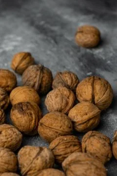 Selective focus, harvested walnut in shell Stock Photos