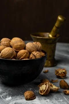 Selective focus, harvested walnut in shell Stock Photos