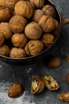 Selective focus, harvested walnut in shell Stock Photos