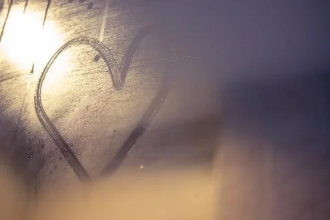 Selective focus on heart shape on mirror in bathroom Stock Photos