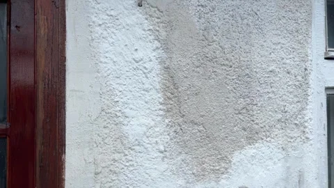 Selective focus home improvement facade whitewashing Stockbeeldmateriaal 334329649