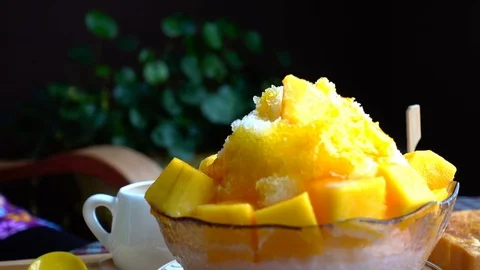 Selective focus of ice dessert and eating with spoon Stock Footage 70686932