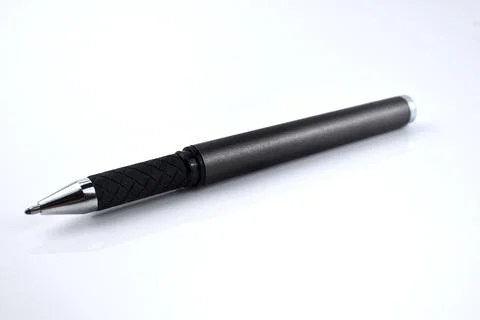 Selective focus image of black pen isolated on a white background Stock Photos