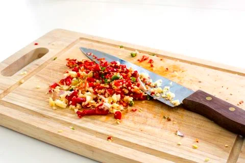 Selective focus image of chopped garlic with red and green hot chilli and a k Stock Photos