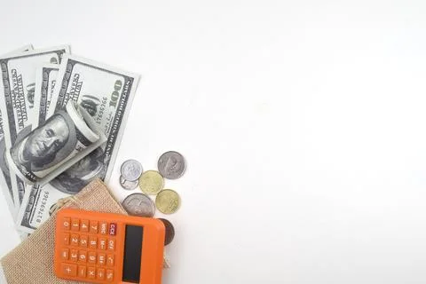 Selective focus image of coin, calculator and bank note isolated on white bac Stock Photos