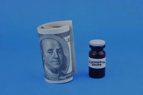 Selective focus image of corona virus vaccine and bank note. Medical concept Stock Photos