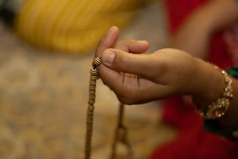 Selective focus image hand of muslim woman holding a prayer beads with copy Stock Photos