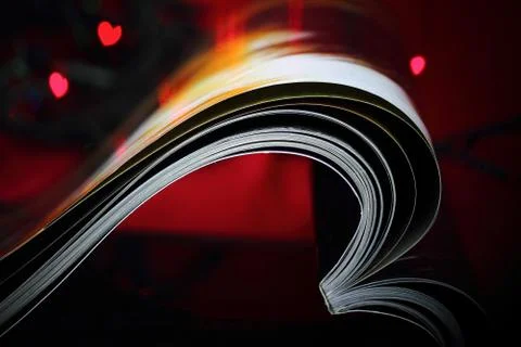 Selective focus image of magazine folded into a heart shape Stock Photos