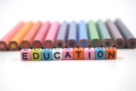 Selective focus image of pencil color with EDUCATION beads wording isolated o Stock Photos