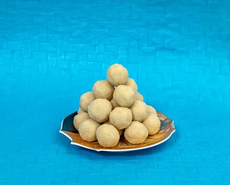 Selective focus image of a pile of delicious Indian sweet Rava , semolina lad Stock Photos