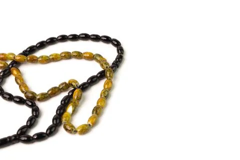 Selective focus image of prayer beads isolated on a white background Stock Photos