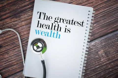 Selective focus image of stethoscope and note book with the greatest health i Stock Photos