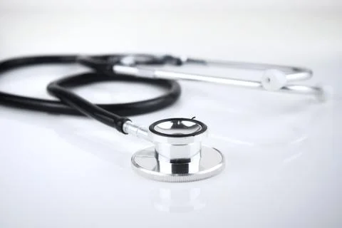 Selective focus image of stethoscope on a white background with blur backgrou Stock Photos