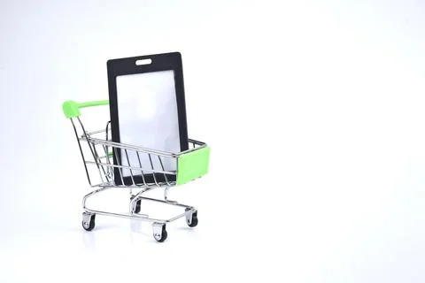 Selective focus image of trolley cart with tagging isolated in white backgrou Stock Photos