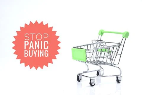 Selective focus image of trolley cart with Stop Panic Buying wording isolated Stock Photos