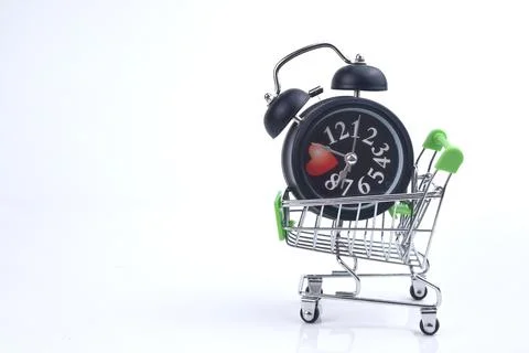 Selective focus image of trolley cart with alarm clock isolated in white back Stock Photos