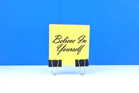 Selective focus image of yellow sticky note with Believe in Yourself wording  Stock Photos