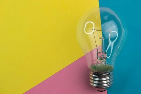 Selective focus, incandescent light on a colored background Stock Photos