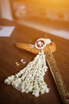 Selective focus on indonesian wedding attributes such as groom's dagger wrapped Stock Photos