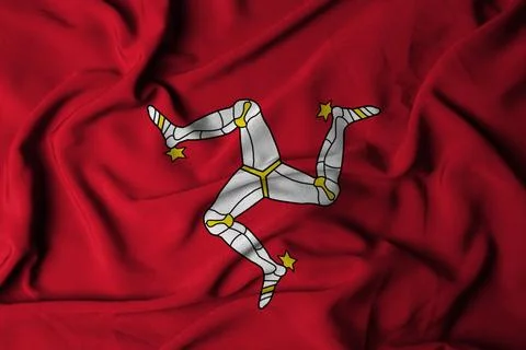 Selective focus of isle of man flag, with waving fabric texture. Stock Illustration