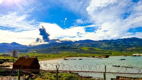 Selective focus. Landscape view with volcano eruption on the island of Stock Photos