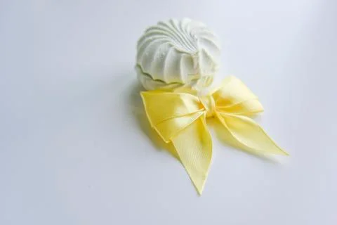 Selective focus at the light green marshmallow with yellow ribbon Stock Photos