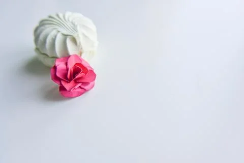 Selective focus at the light green marshmallow with fuchsia flower Stock Photos