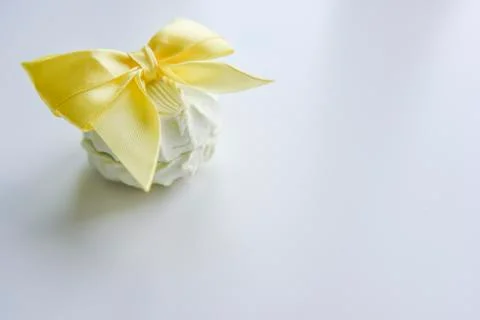 Selective focus at the light green marshmallow with yellow ribbon Stock Photos