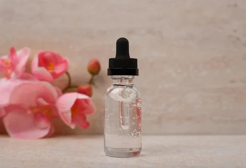 Selective focus, liquid gel or skin serum for daily or anti aging treatment Stock Photos