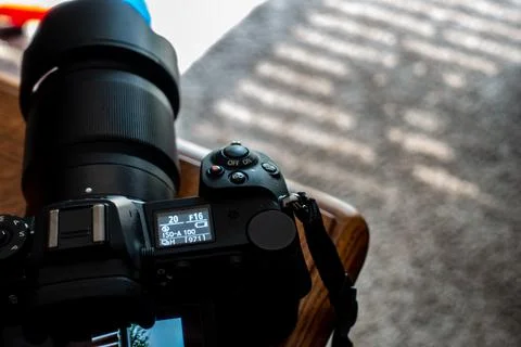 Selective focus on low battery display of a high end camera before shutting down Stock Photos