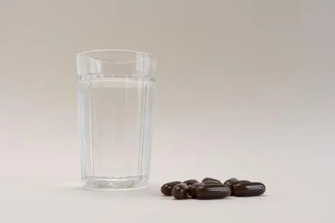 Selective Focus Lying Scattered Brown Sunflower Lecithin Softgel Pill Capsules Stock Photos