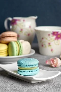 Selective focus of Macarons on a white ceramic plate during the afternoon tea Stock Photos