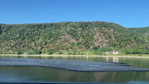 Selective focus majestic Rhine River winding between green mountain slopes Stock-Footage 345592964