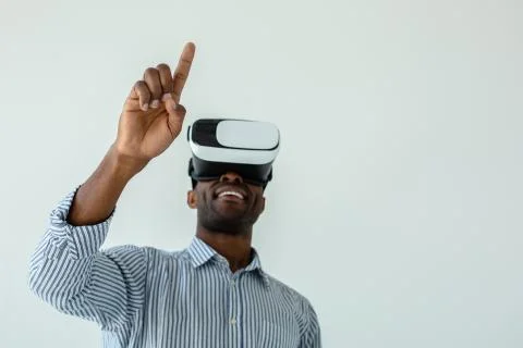 Selective focus of mans hand when testing VR device Stock Photos