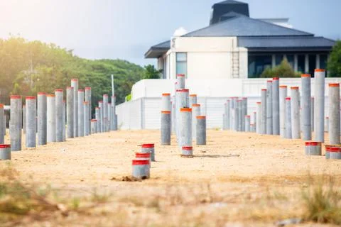 Selective focus to many round prestressed concrete piles that have been hamme Stock Photos