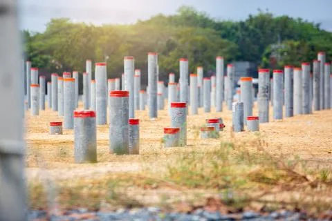 Selective focus to many round prestressed concrete piles that have been hamme Stock Photos