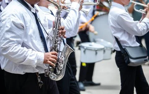 Selective focus to Marching Band Performing Live in Street Parade Stock Photos