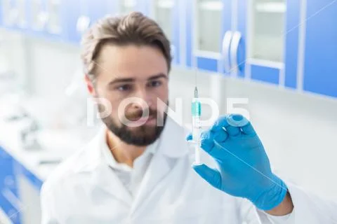 Selective focus of medical syringe Stock Photos