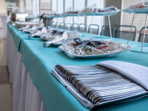 Selective focus on metal cutlery on the table. Stock Photos