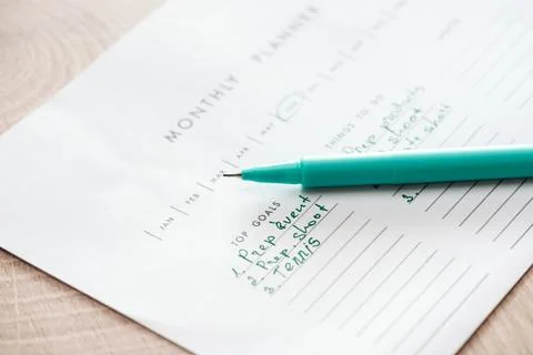 Selective focus monthly planner green Stock Photos