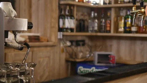 Selective focus of mug of beer standing on wooden table in bar Stock Footage 83204709