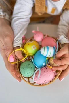 Selective focus on multicolor and design Easter Eggs on the hand Stock Photos