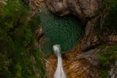 Selective focus, a natural waterfall in the forest Stock Photos