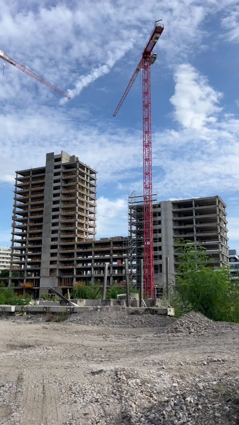Selective focus new apartment buildings at active construction site Video stock 346077167