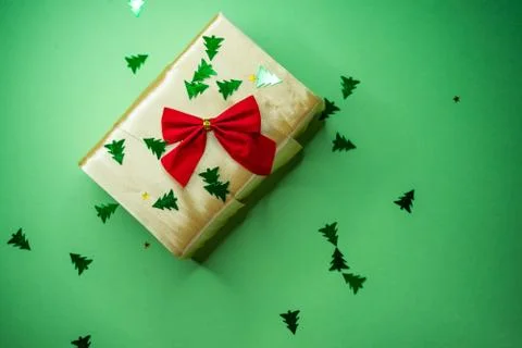 Selective focus, new year gift on green background, copy space Stock Photos