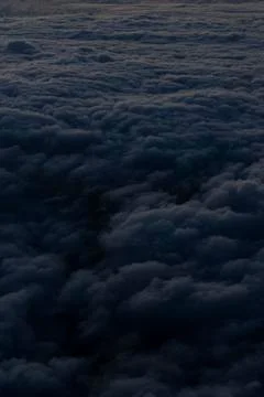 Selective focus, night sky, fluffy clouds Foto stock
