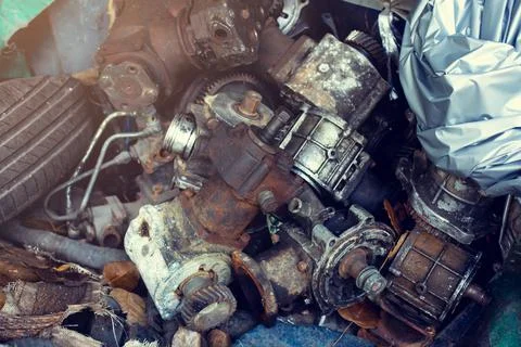 Selective focus to old part of engine. Pile of rusty and dirty obsoleted old  Stock-Fotos