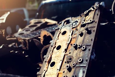 Selective focus to old part of engine. Pile of rusty and dirty obsoleted old  Stock Photos