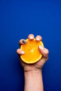Selective focus, orange in hand Stock Photos