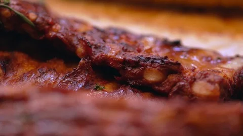 Selective focus panning shot over grilled meat Stock Footage 115075636